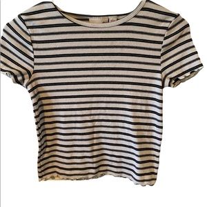 A black and white Sonoma fitted girls’ shirt. Size large.